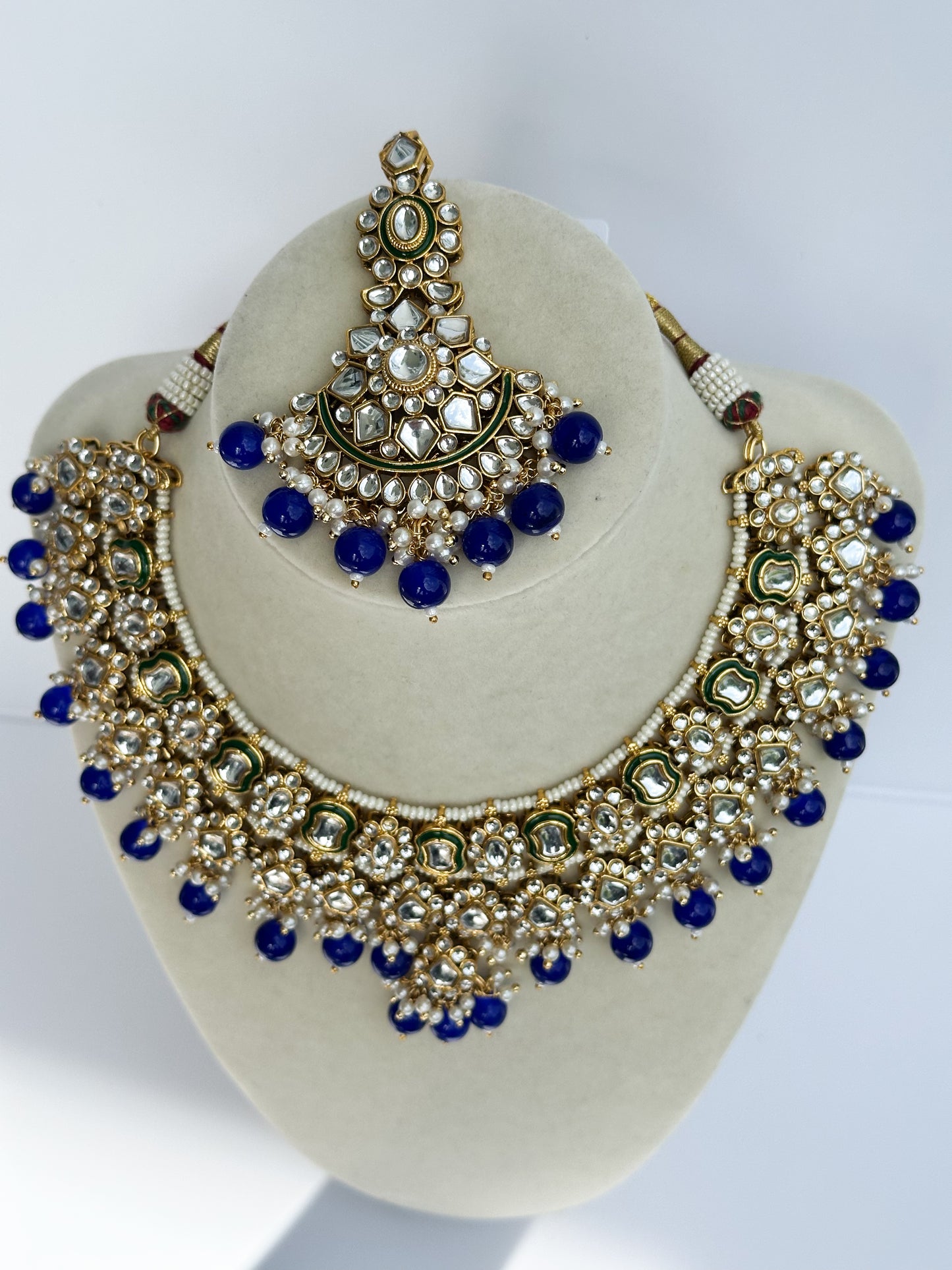 Sukoon Kundan Necklace Set (Includes Earrings & Tikka)