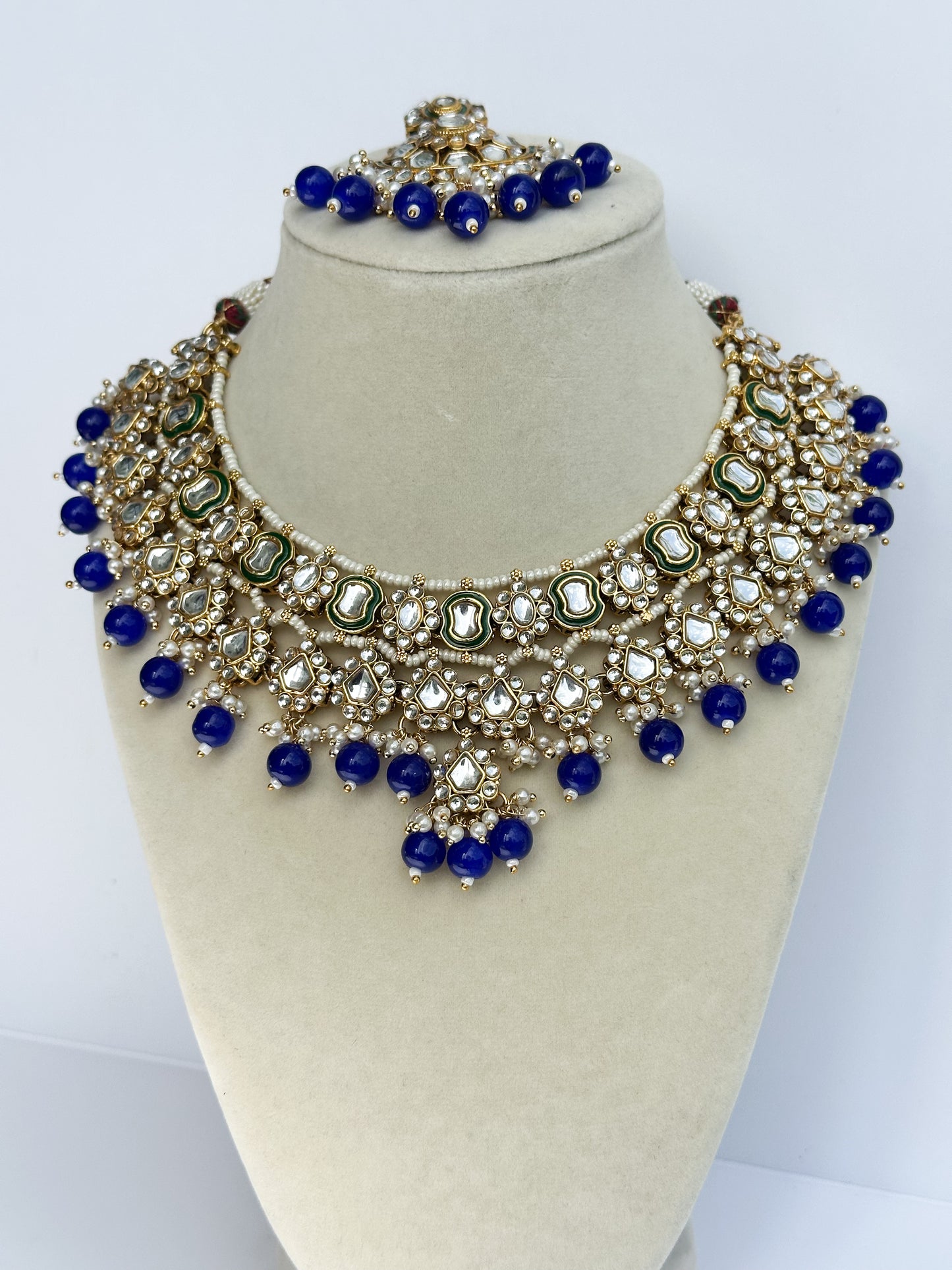 Sukoon Kundan Necklace Set (Includes Earrings & Tikka)